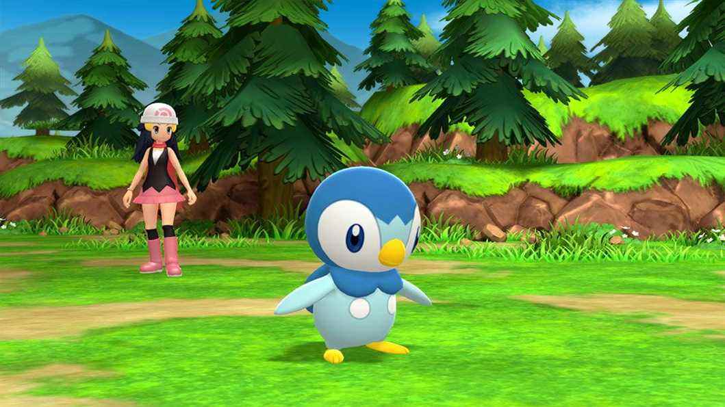 Un dresseur de Pokémon et Piplup se préparent au combat dans Brilliant Diamond et Shining Pearl