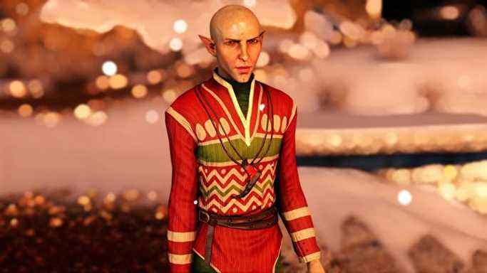 Dragon Age : Solas de l'Inquisition portant un pull de Noël moche et fronçant les sourcils.