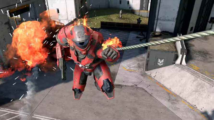 Un Spartan est en feu en utilisant le grappin dans Halo Infinite.
