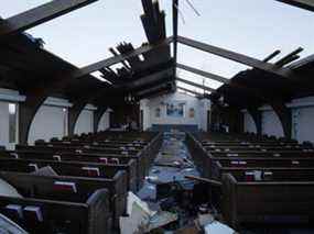 Vue intérieure des dommages causés par la tornade à l'église Emmanuel Baptist à Mayfield, Ky., samedi 11 décembre 2021. Plusieurs tornades ont ravagé des parties du bas Midwest vendredi soir, laissant un grand chemin de destruction.