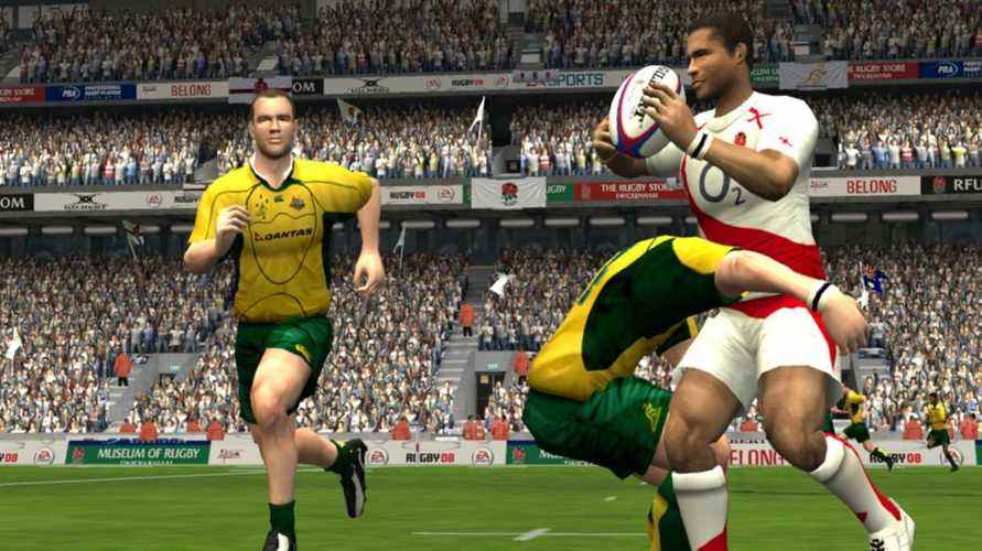 Rugby 08 : Jason Robinson tient le ballon alors qu'il est plaqué par un joueur de rugby australien