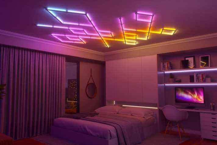 Lampes Nanoleaf Lines installées au plafond dans une chambre. 