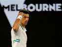 Le Serbe Novak Djokovic réagit lors de son dernier match contre le Russe Daniil Medvedev à l'Open d'Australie, Melbourne, Australie, le 21 février 2021
