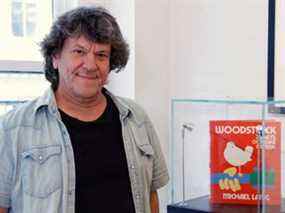 Le producteur de Woodstock Michael Lang pose lors d'une exposition de photos qui célèbre le 50e anniversaire de Woodstock à New York, le 9 août 2019.