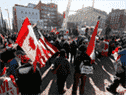 Des manifestants du Freedom Convoy 2022 manifestent près de la colline du Parlement à Ottawa le 31 janvier 2022.