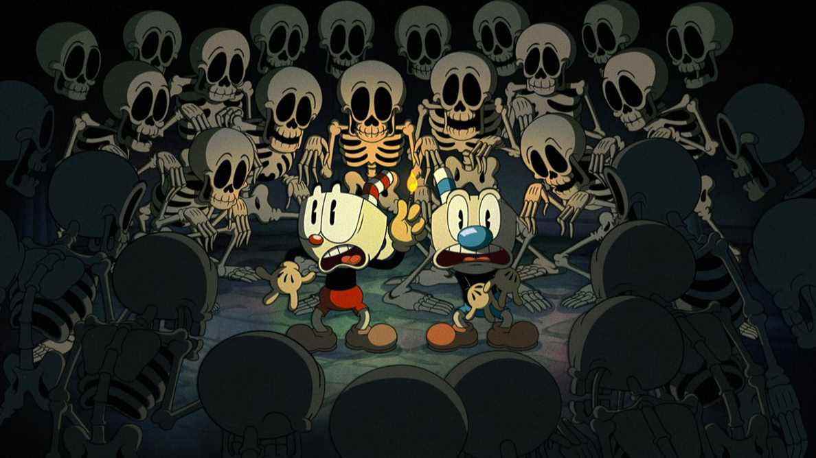 Cuphead et Mugman entourés de squelettes