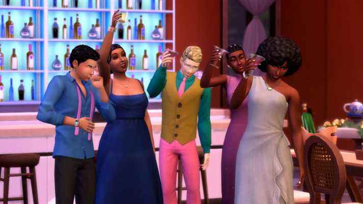 Un groupe de Sims s'amuse lors d'une soirée de fin d'études.