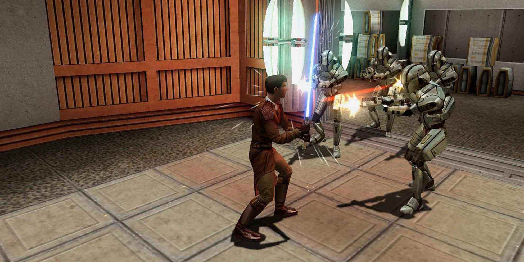Un Jedi combattant un groupe de droïdes dans Star Wars: Knights of the Old Republic