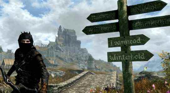 A screenshot from Elder Scrolls 5: Skyrim showing a stealth character next to a sign post just outside Whiterun.