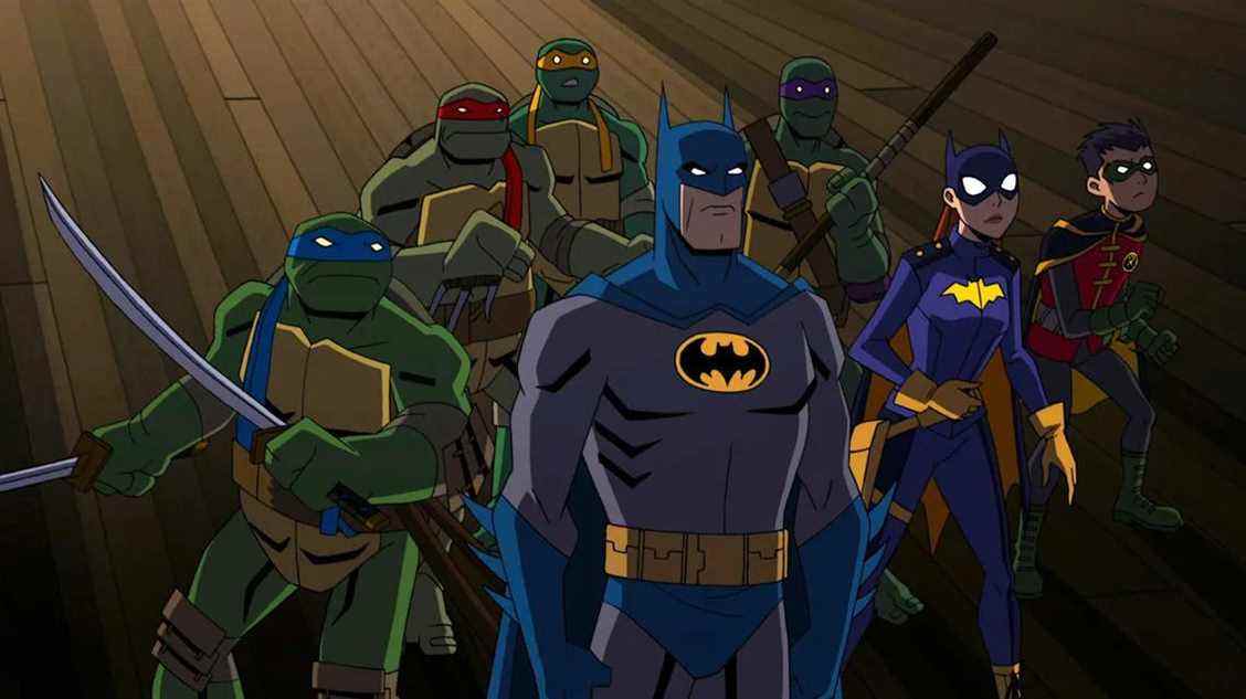 (LR) Leonardo, Raphael, Michelangelo, Donatello, Batman, Batgirl et Robin dans Batman contre Teenage Mutant Ninja Turtles.
