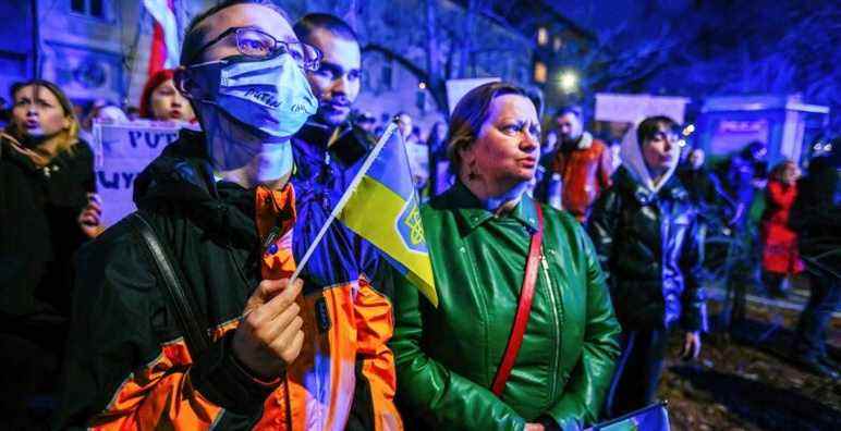 A member of Ukrainian community seen with a flag during the demonstration. Following the beginning of the Russian invasion of Ukraine, members of the Ukrainian community and supportive Poles and Belarusians protested near diplomatic missions of the Russian Federation to express their opposition to Russian military aggression. In Krakow, where Ukrainian immigration is particularly numerous, several thousand people gathered in front of the Russian consulate. (Photo by Filip Radwanski / SOPA Images/Sipa USA)(Sipa via AP Images)
