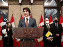 Le premier ministre Justin Trudeau parle de la manifestation en cours des camionneurs lors d'une conférence de presse sur la colline du Parlement, le 14 février.