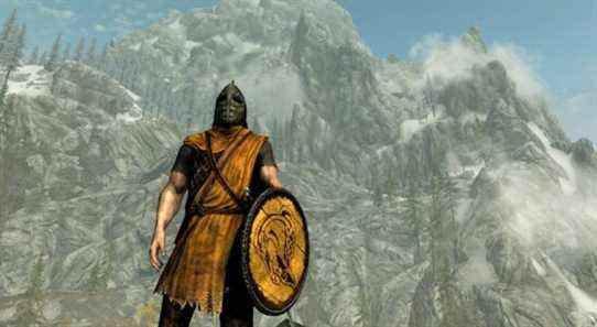 Image from Skyrim showing a guard in the foreground with the Throat of the World mountain in the background.