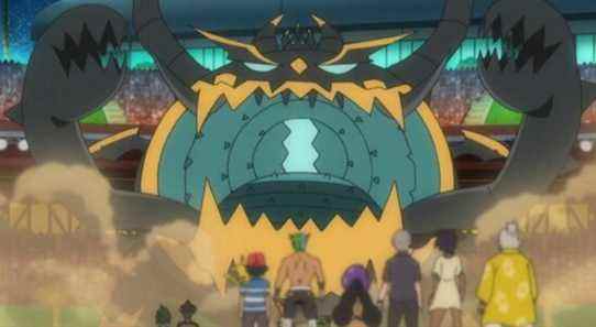 Guzzlord looming over several protagonists in the Pokemon anime