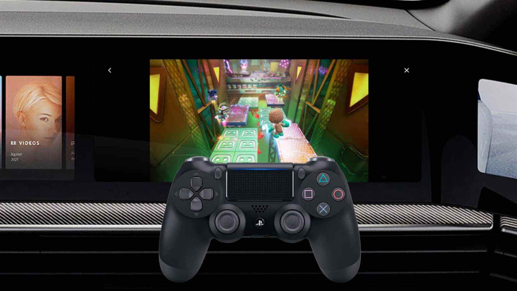 Une commande PS5 DualSense devant l'écran du passager dans le Sony Vision-S 02