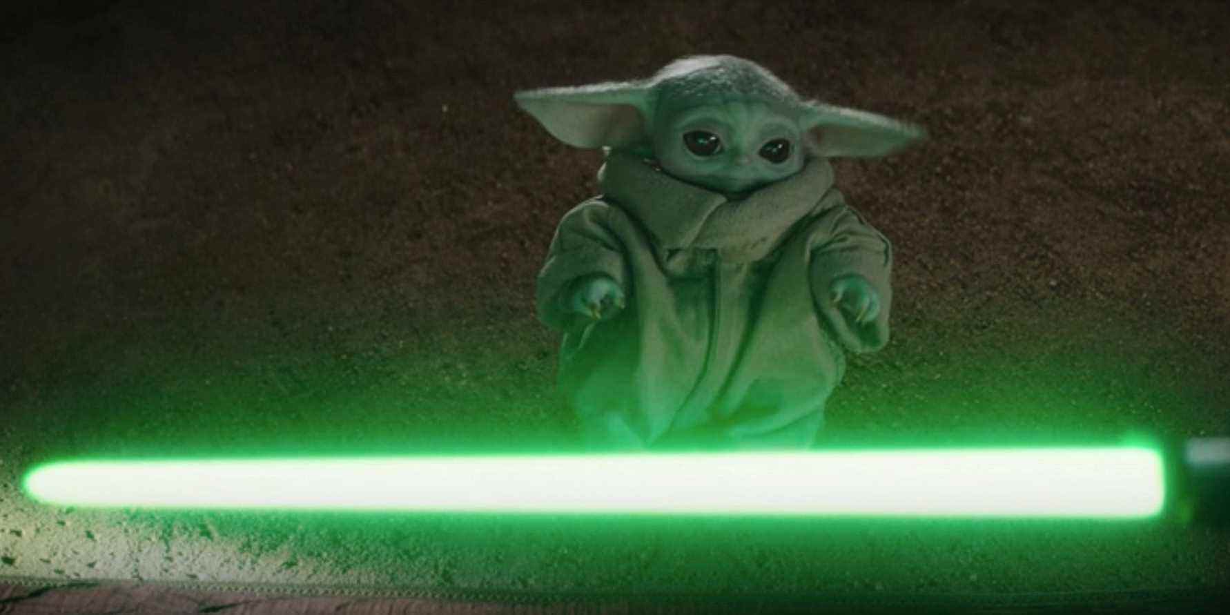 Sabre laser de bébé Yoda Grogu dans le livre de Boba Fett