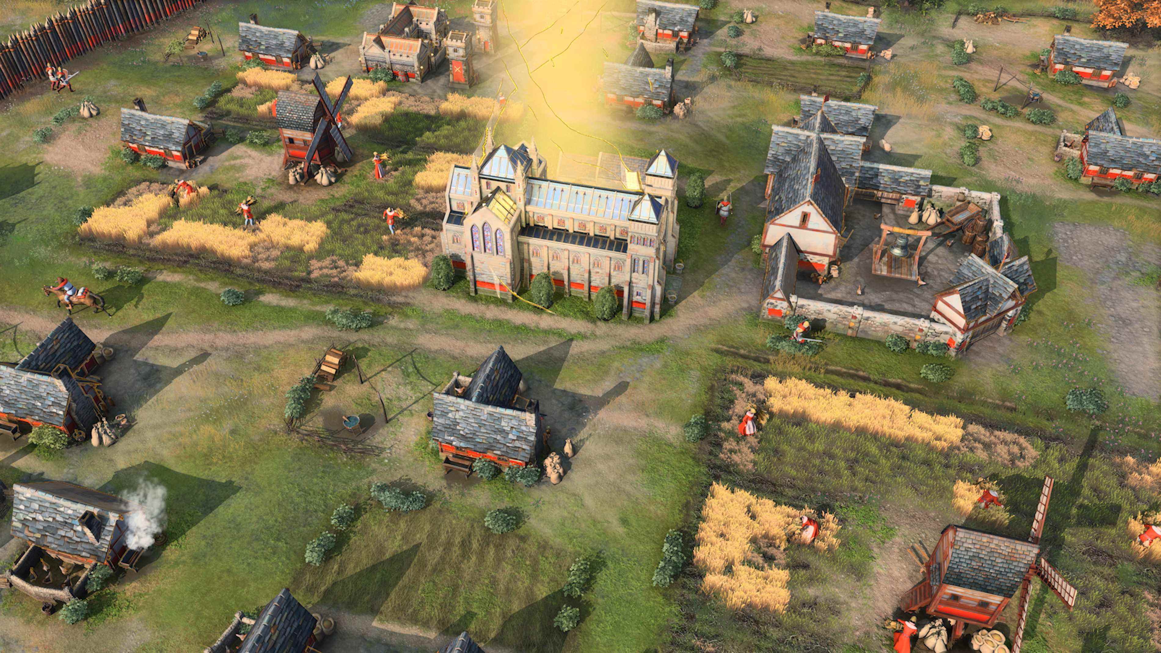 Gameplay d'Age of Empires 4 avec une cathédrale