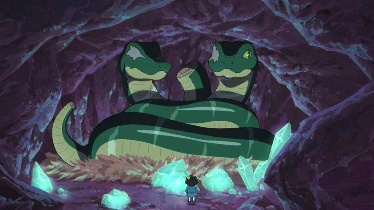 Un serpent à deux têtes dans une grotte avec Bojji le regardant 