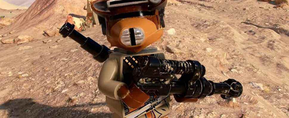 A LEGO bounty hunter standing on a desert planet in LEGO Star Wars: The Skywalker Saga
