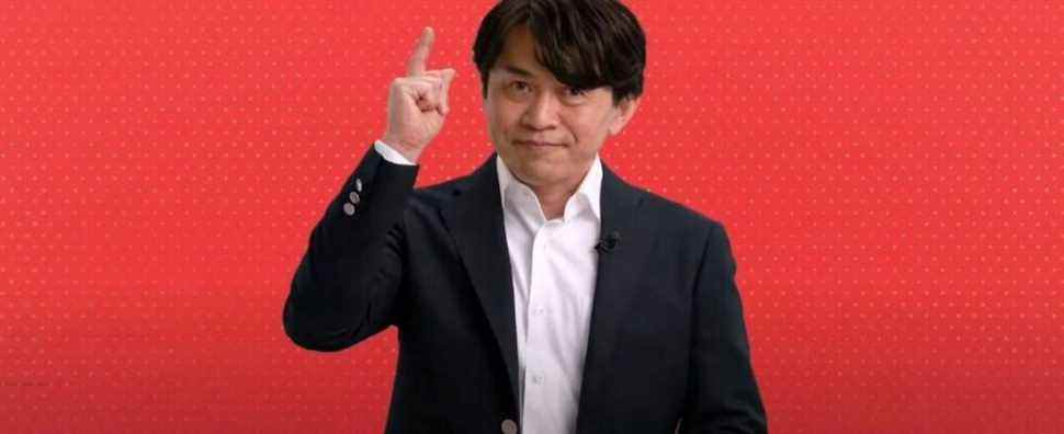 Yoshiaki Koizumi raising a finger during a Nintendo Direct