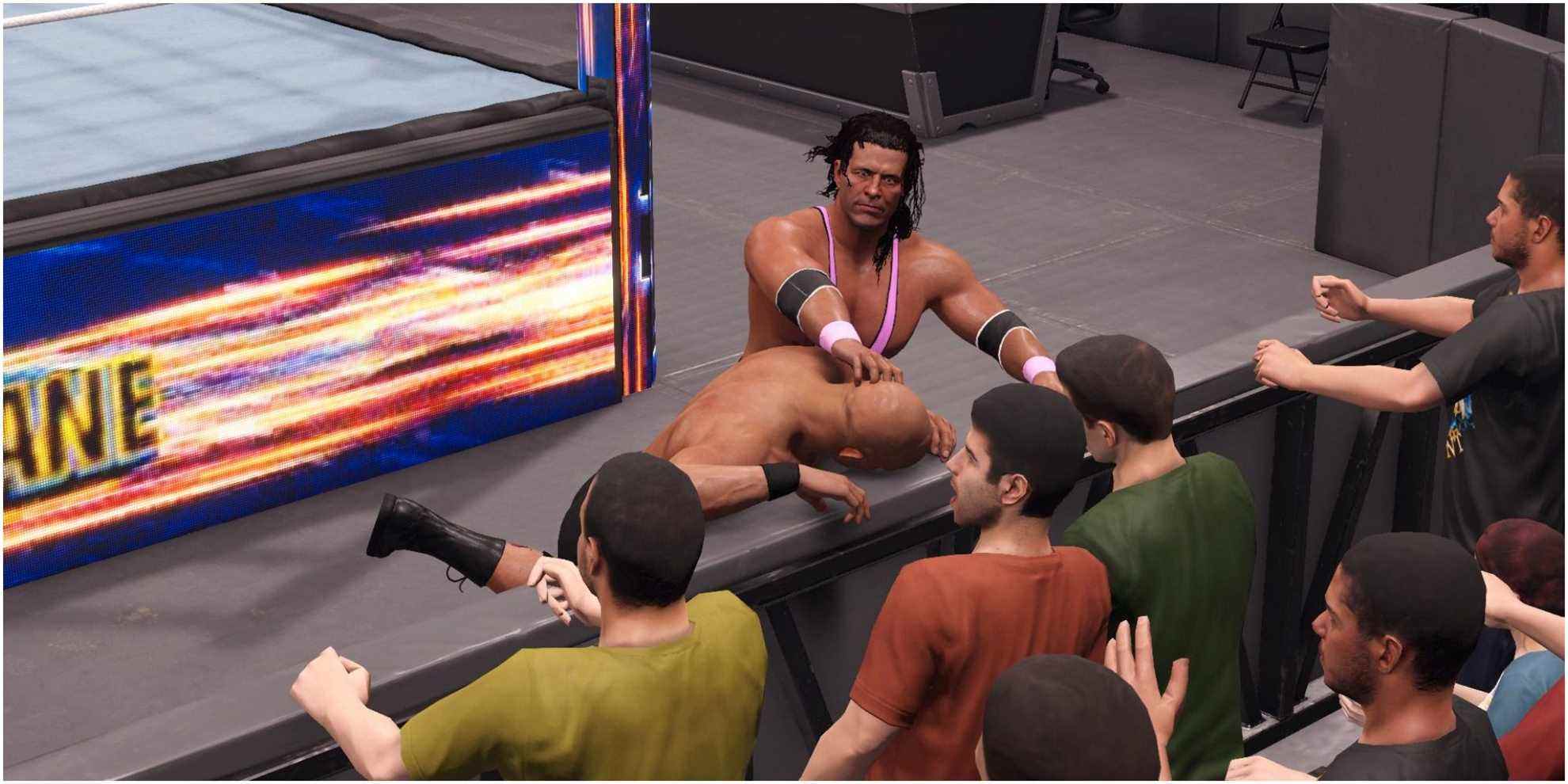 Bret claque la tête d'Austin à l'extérieur du ring