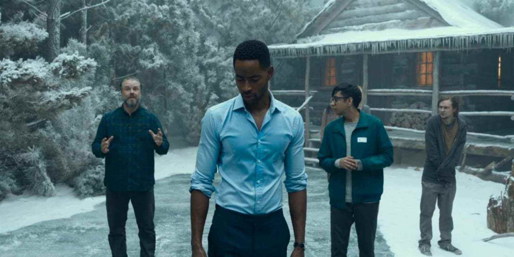 Les personnages principaux dans une cabane d'hiver dans le film Escape Room 2019
