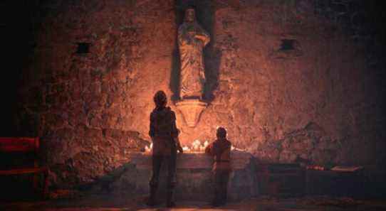 A Plague Tale Innocence Amicia and Hugo standing in a church