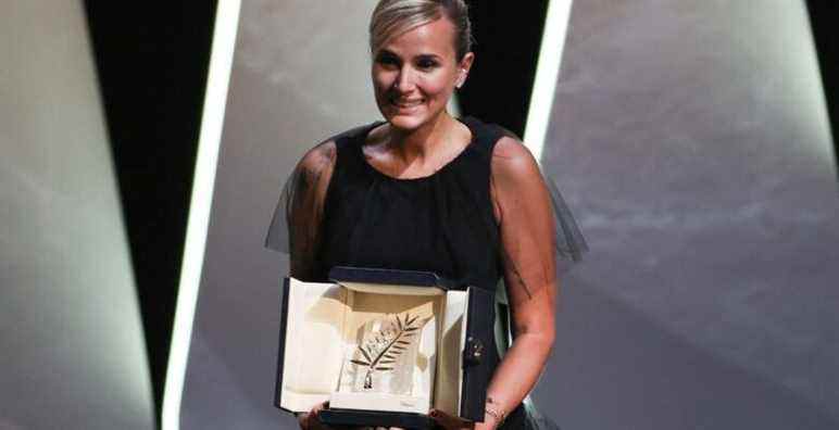 Julia Ducournau poses with the Palme d'Or 'Best Movie Award' for 'Titane' Closing Ceremony, during the 74th International Cannes Film Festival, at Palais des Festivals, Cannes FRANCE - 17/07/2021 (Sipa via AP Images)