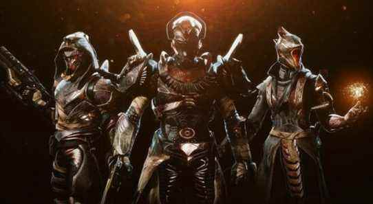 Destiny 2 Trials of Osiris A Hunter with a raised gun, Titan with a gun to their side and Warlock with a solar orb in their hand wearing Trials of Osiris armor against a dark background