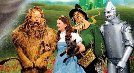 The cast of The Wizard of Oz on the yellow brick road