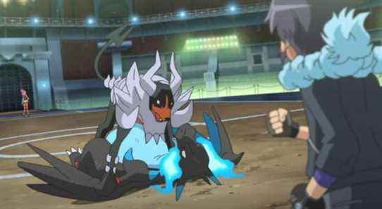 A Mega Houndoom battling a Mega Charizard X in the Pokemon X and Y anime