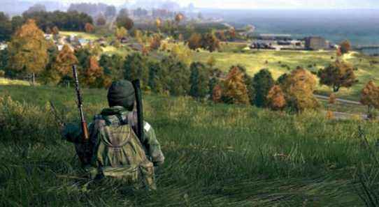 Image from DayZ showing a player sitting down peacefully on a grassy hill.
