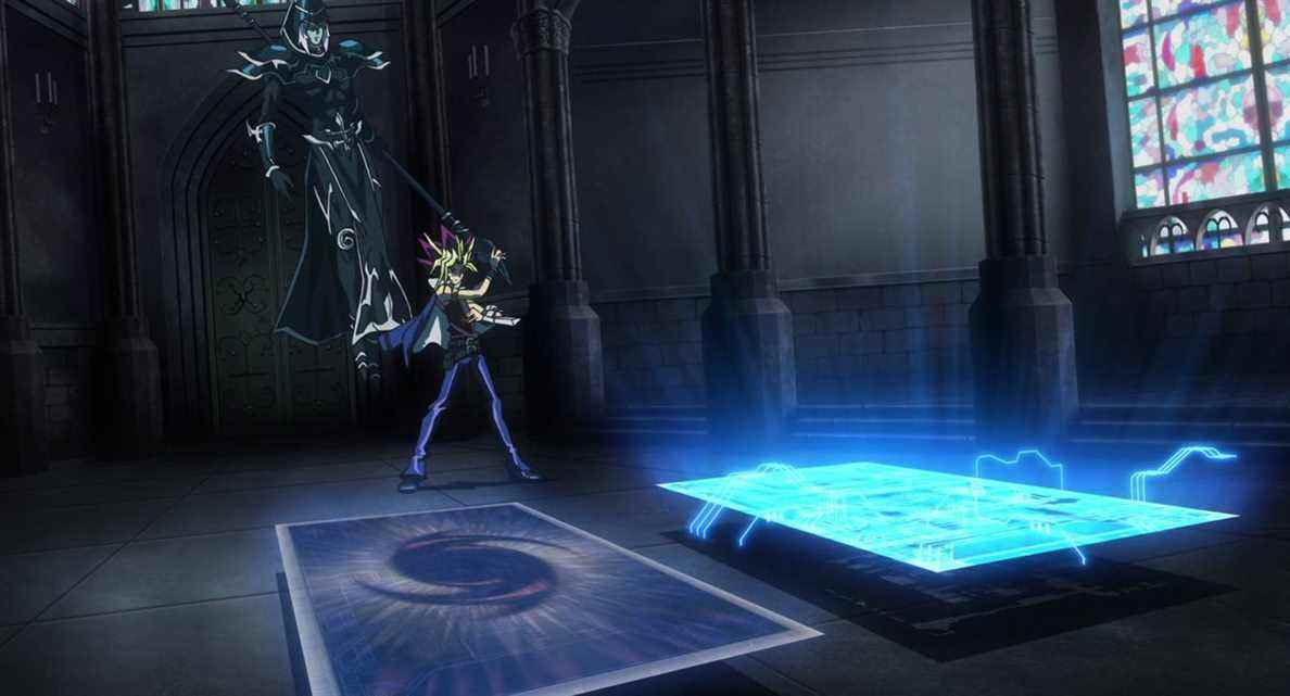 Yugi invoquant une carte devant lui tandis qu'un personnage de carte plane derrière lui dans Yu-Gi-Oh: The Dark Side of Dimensions