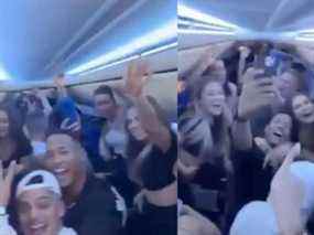 Cette capture d'écran tirée d'une publication vidéo sur les réseaux sociaux montre des personnes faisant la fête sur un vol Sunwing sans masque.