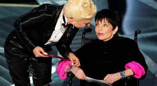 Lady Gaga, left, and Liza Minnelli present the award for best picture at the Oscars on Sunday, March 27, 2022, at the Dolby Theatre in Los Angeles. (AP Photo/Chris Pizzello)