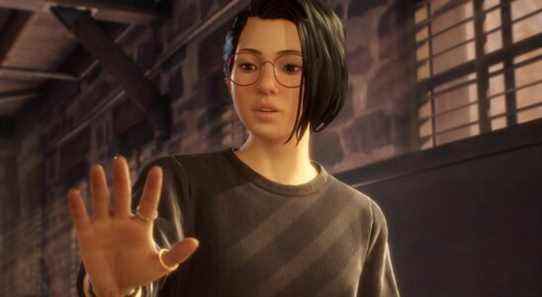 Alex Chen from Life Is Strange: True Colors looking at her hand in wonder