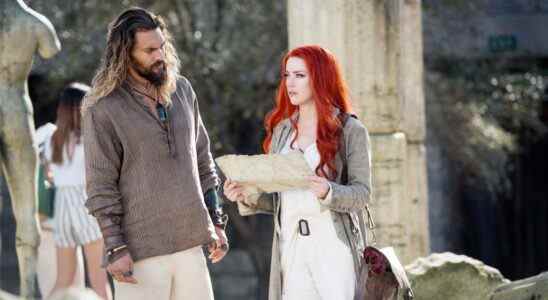 Jason Momoa and Amber Heard in Aquaman, looking at a map.