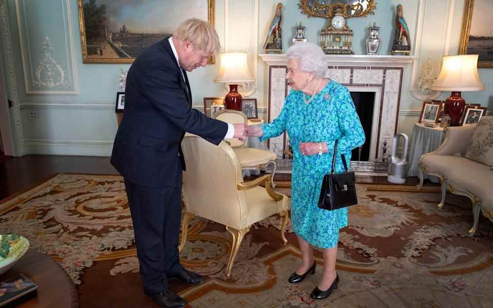 La reine invite Boris Johnson à devenir Premier ministre et à former un nouveau gouvernement lors d'une audience au palais de Buckingham en septembre 2019 – PA