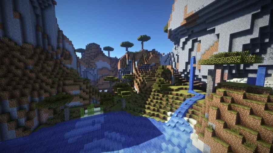 Meilleurs shaders Minecraft: Le shader Too Many Effects montrant une cascade se jetant dans un lac.