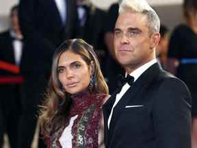 Robbie Williams et Ayda Field lors d'une première à Cannes.