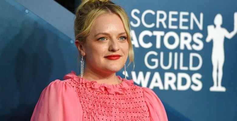 Elisabeth Moss arrives at the 26th annual Screen Actors Guild Awards at the Shrine Auditorium & Expo Hall on Sunday, Jan. 19, 2020, in Los Angeles. (Photo by Jordan Strauss/Invision/AP)