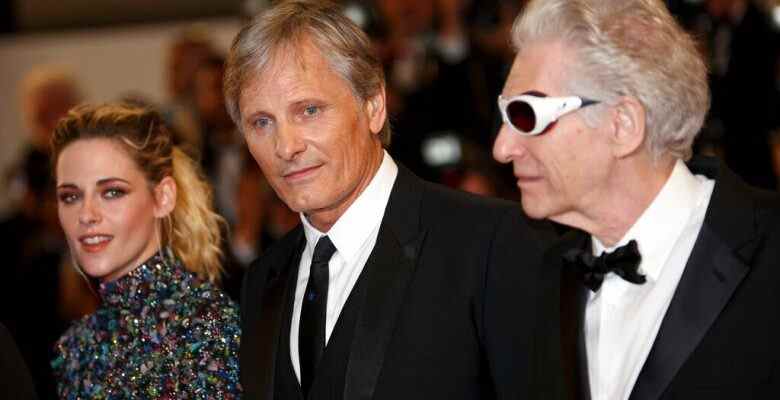 Kristen Stewart, from left, Viggo Mortensen, and director David Cronenberg pose for photographers upon arrival at the premiere of the film 'Crimes of the Future' at the 75th international film festival, Cannes, southern France, Monday, May 23, 2022. (Photo by Vianney Le Caer/Invision/AP)