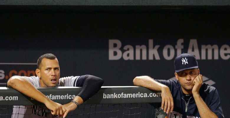 New York Yankees' Alex Rodriguez, left, and Derek Jeter look on from the dugout during a baseball game against the Baltimore Orioles, Wednesday, Sept. 11, 2013, in Baltimore. (AP Photo/Patrick Semansky)