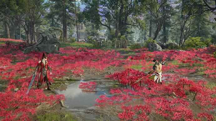 Deux personnages dans Naraka Bladepoint debout dans des fleurs rouges.