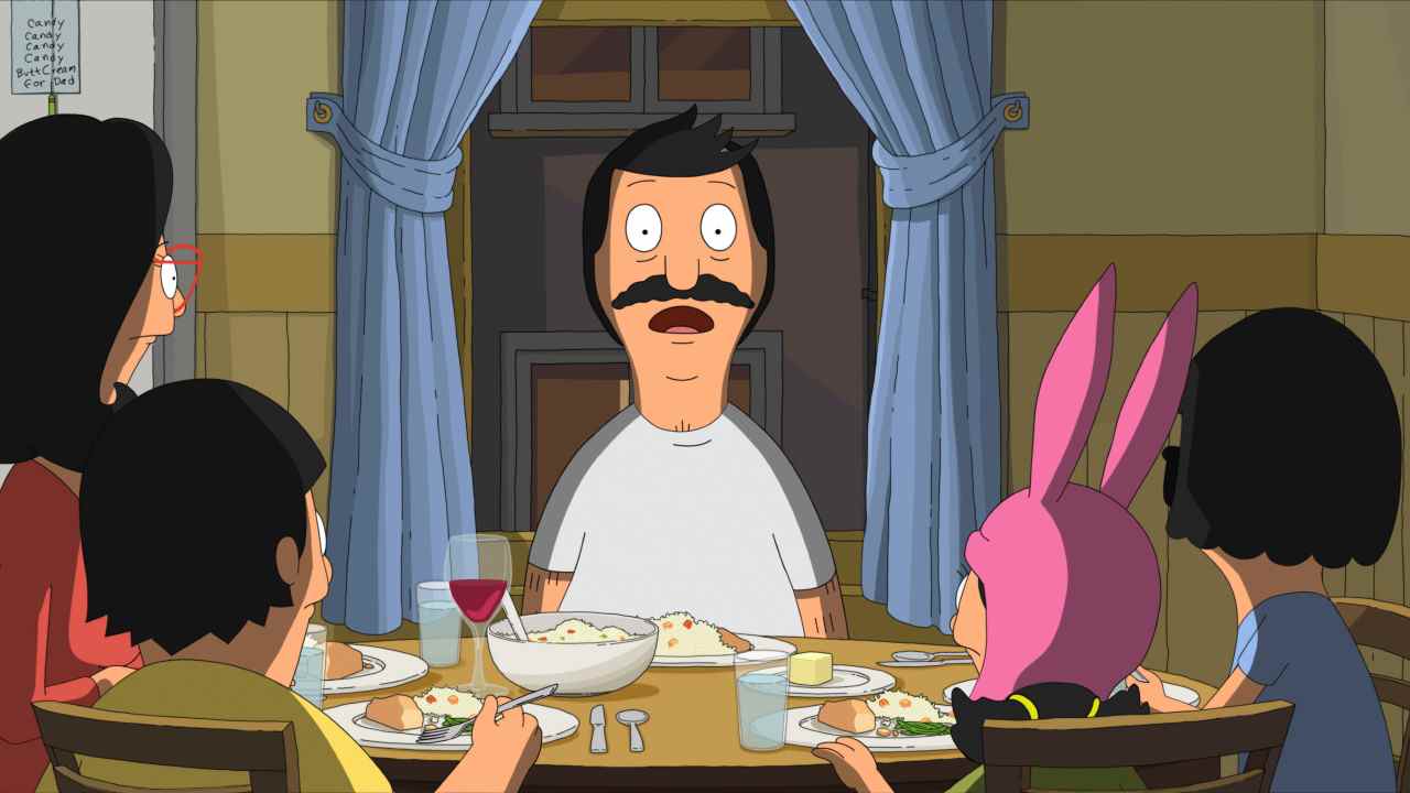 Bob panique devant sa famille à table dans le film The Bob's Burgers.