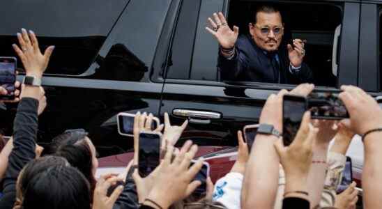 U.S. actor Johnny Depp waves to fans as he leaves the Fairfax Circuit Court on May 26, 2022, in Fairfax, Va. The jury has entered deliberations in the defamation lawsuit filed by U.S. actor Johnny Depp against his former wife, U.S. actress Amber Heard, after she wrote an op-ed in The Washington Post in 2018 that, without naming Depp, accused him of domestic abuse. (Photo by Samuel Corum/Sipa USA)(Sipa via AP Images)