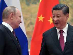 Le président russe Vladimir Poutine assiste à une réunion avec le président chinois Xi Jinping à Pékin, en Chine, le 4 février 2022.