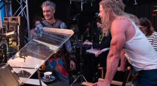 (L-R): Director Taika Waititi as Korg and Chris Hemsworth as Thor on the set of Marvel Studios' THOR: LOVE AND THUNDER. Photo by Jasin Boland. ©Marvel Studios 2022. All Rights Reserved.