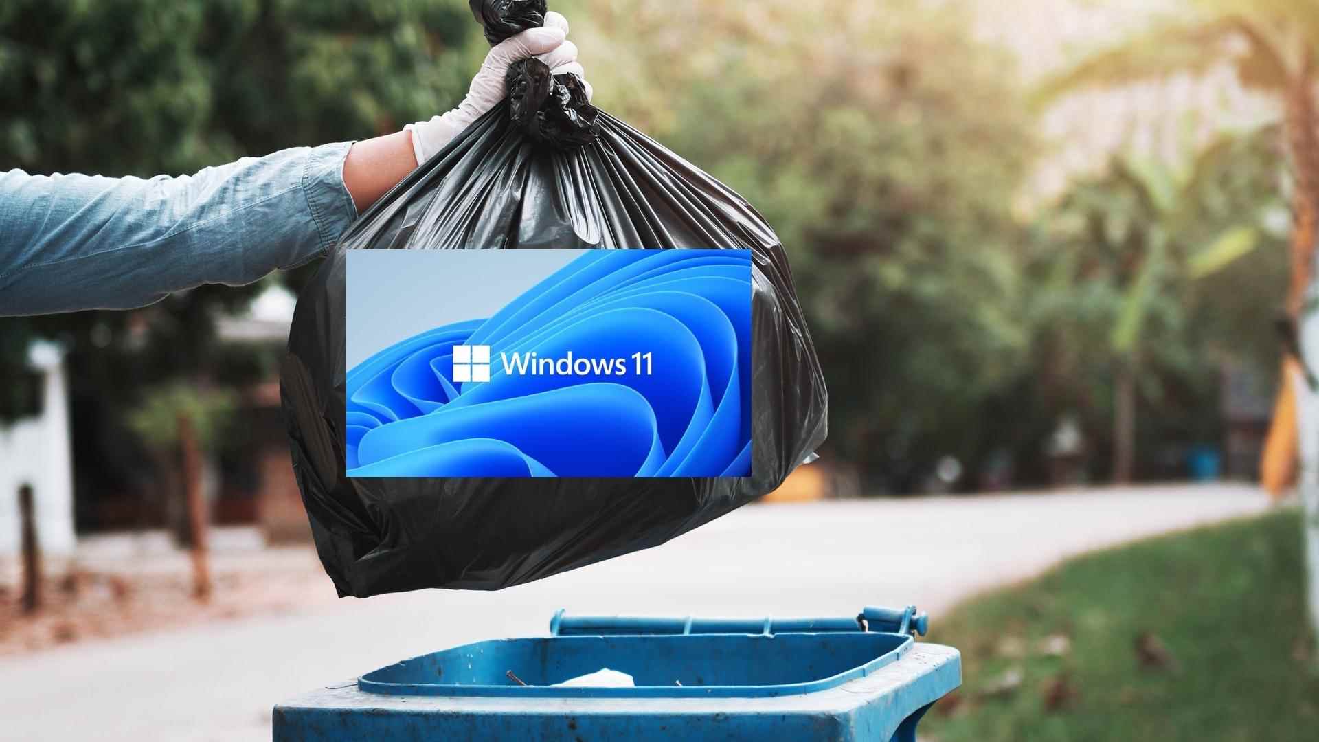 Quelqu'un met une poubelle de marque Windows 11 dans une poubelle.