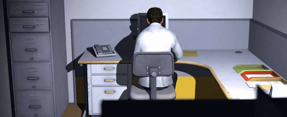 Stanley sits at his computer in the game